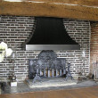 A grey brick fireplace